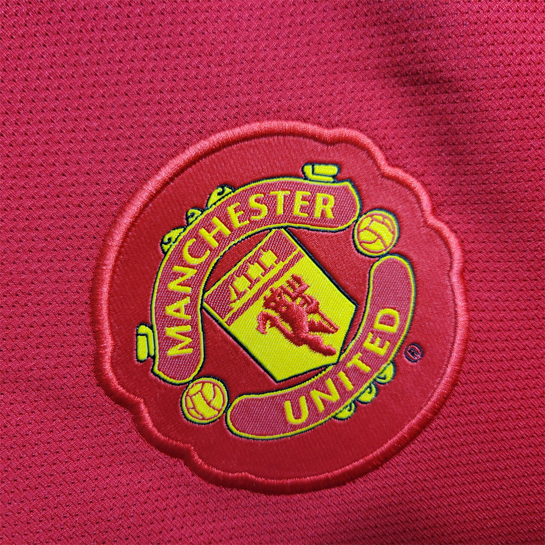 MNU 10-11 Home Shirt badge