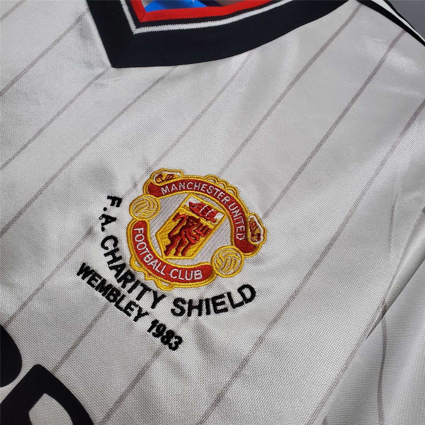 MNU 82-83 Charity Shield Shirt badge