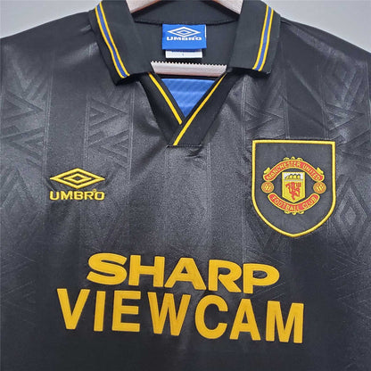 MNU 93-95 Away Shirt sponsor