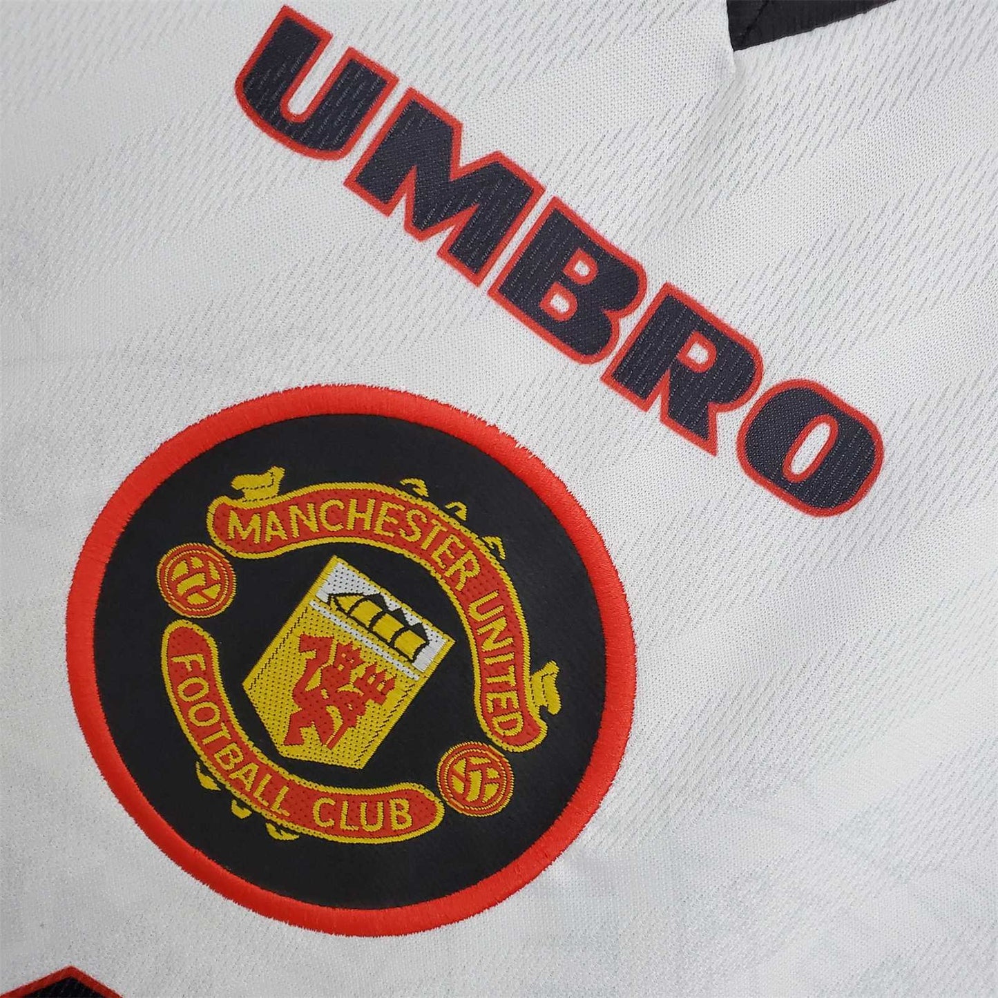 MNU 95-97 Away Shirt badge